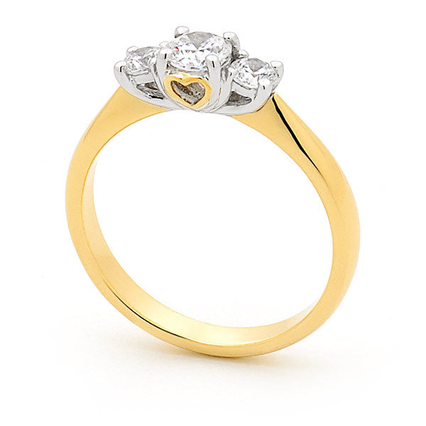 18ct Yellow Gold Round Brilliant Cut Diamond Trilogy Heart Feature Engagement Ring
